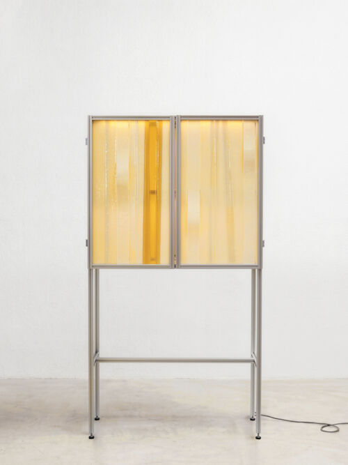 front view of butter honey yellow slumped glass cabinet with aluminium extrusion profile frame design by dutch invertuals