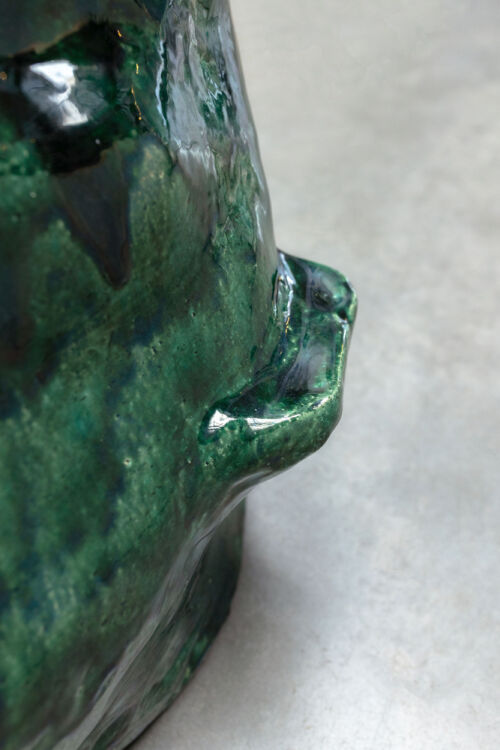 detail of a design object green glazed rock with a socket by dutch invertuals for 5tracks interior design