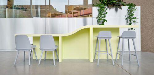 solid surface bended low and high table in 5tracks coworking space in Breda by dutch invertuals